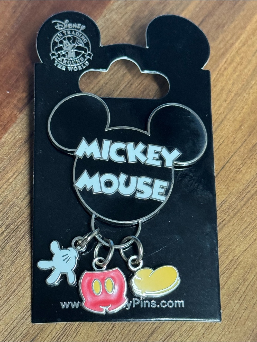 Disney Mickey Mouse Black Enamel Pin with Red, Yellow & White Charms